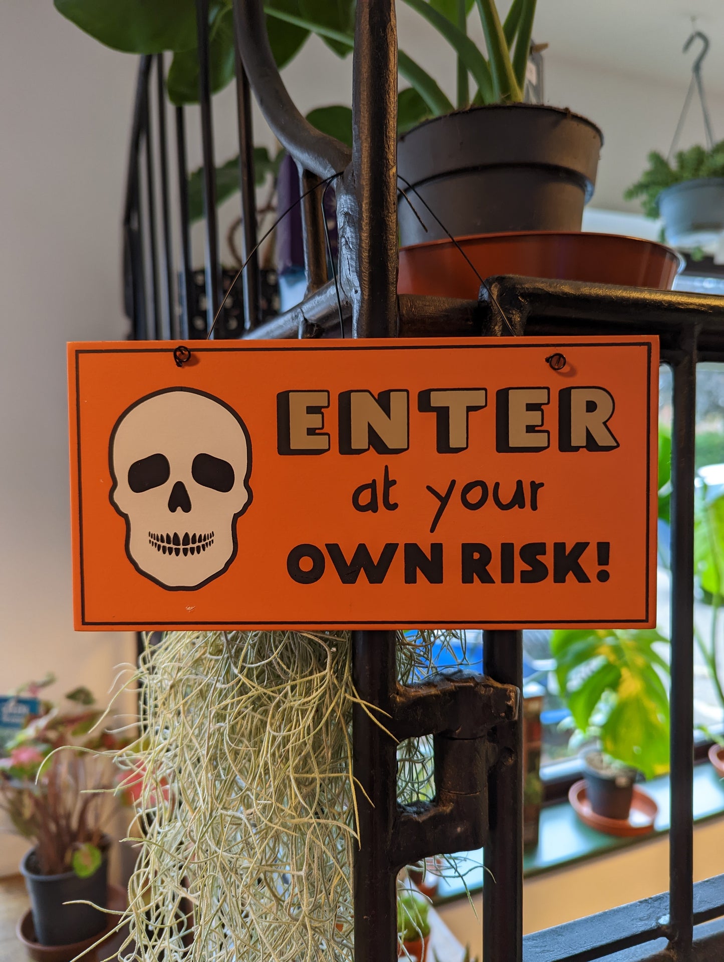 Enter at Your Own Risk Sign